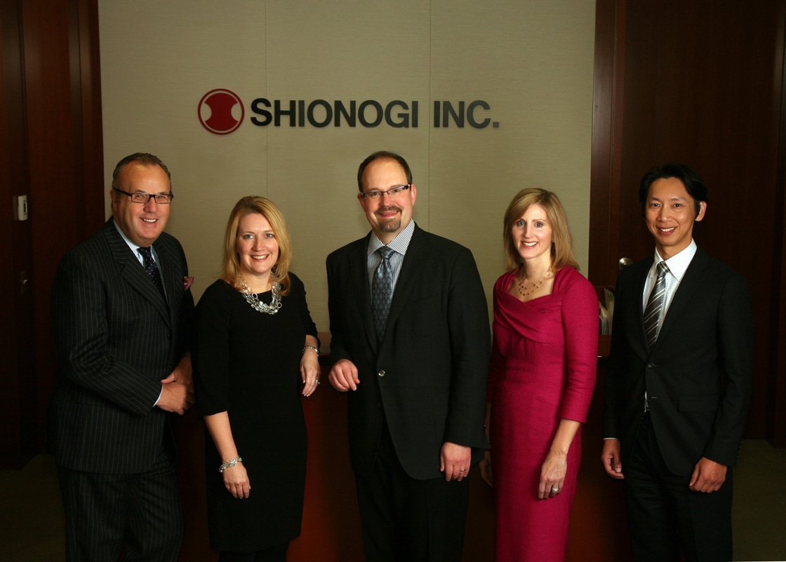 Corporate group portrait in a company reception area