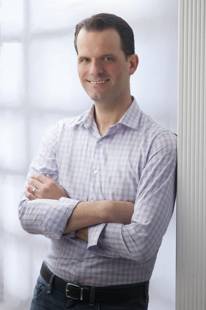 Casual business portrait in window light