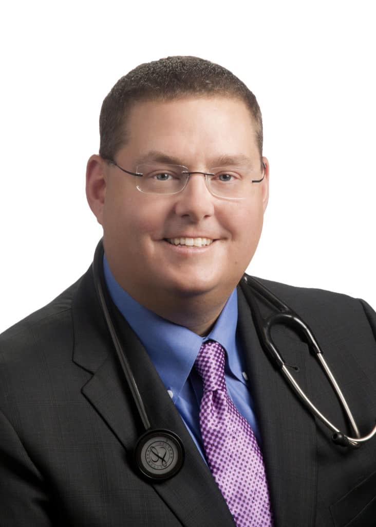 Doctor headshot with stethoscope on a white background