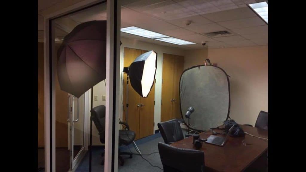 Headshot lighting set up in a corporate conference room