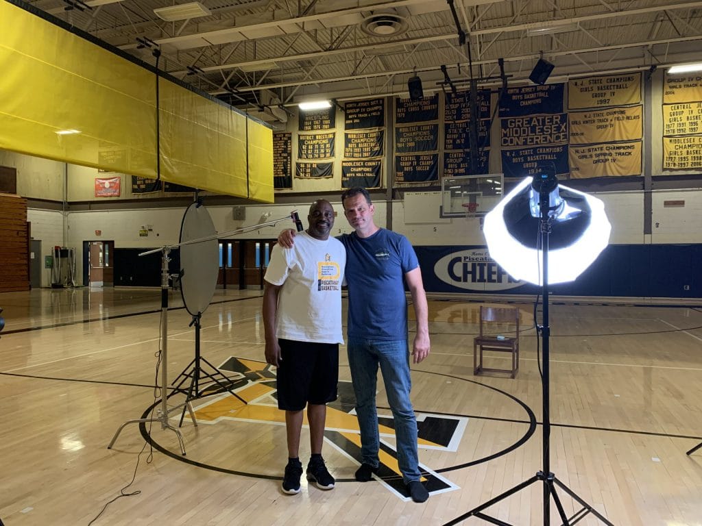 On-location headshot setup in a school gymnasium